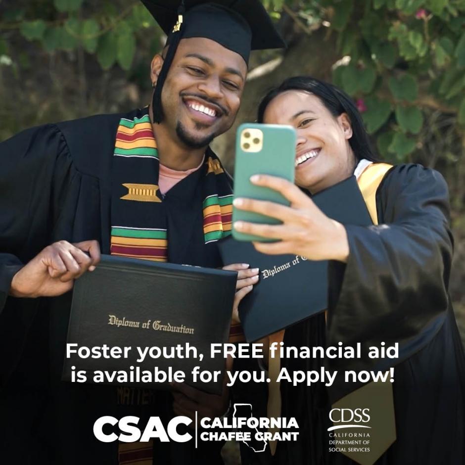 Foster Youth young man a graduate in cap and gown with parent taking a selfie 