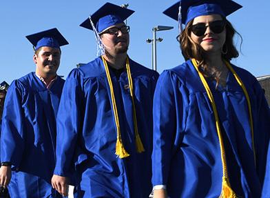 Three Graduates 2017 Walking Modesto Junior College