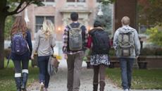 Image of Five Students Walking with back packs